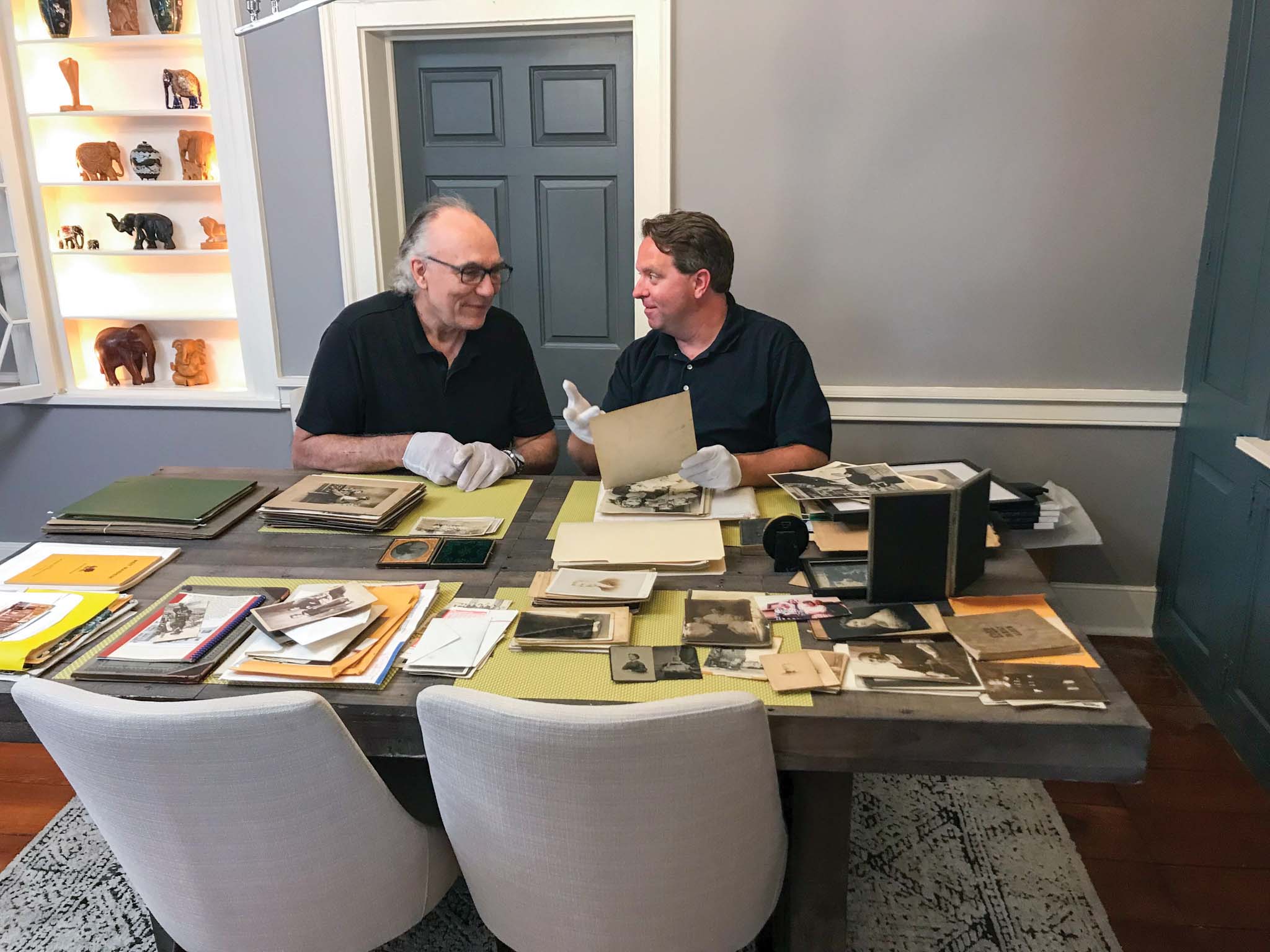 Chris of Manheim, Pennsylvania, reviews family photos with Matt Paxton