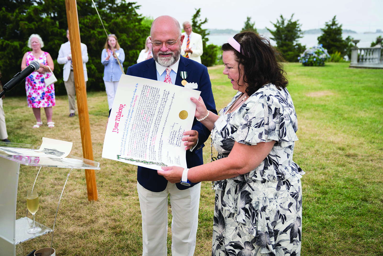 Simons presenting UK Ambassador Dame Karen Pierce with a proclamation of congratulations “in honor of a glorious and historic reign” to HM The Queen for the Platinum Jubilee, July 2022