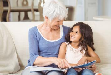 Grandmother and grandchild smiling