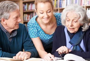 Students and teacher in a library