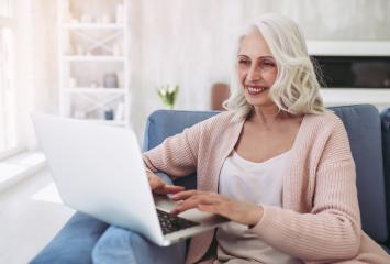 Researcher uses laptop at home