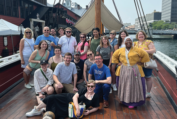 Group photo of Research Services team on a visit to the Boston Tea Party Ships & Museum