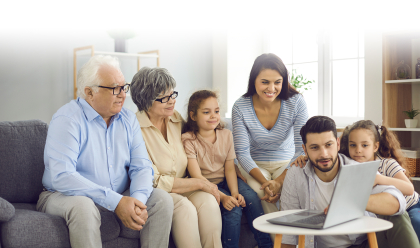 family looking at a computer