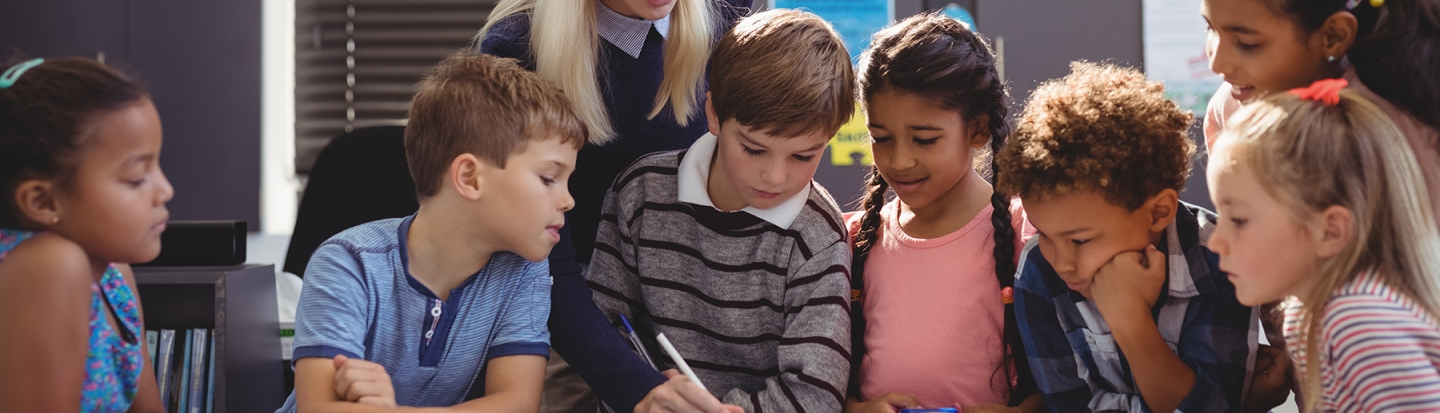 Children learning about family history in a classroom setting