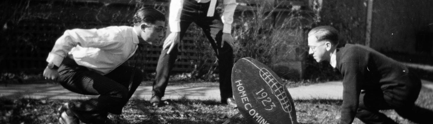 teens playing football