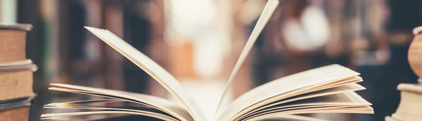 event-sharing-your-family-story-self-publishing-your-genealogy.jpg open book on desk