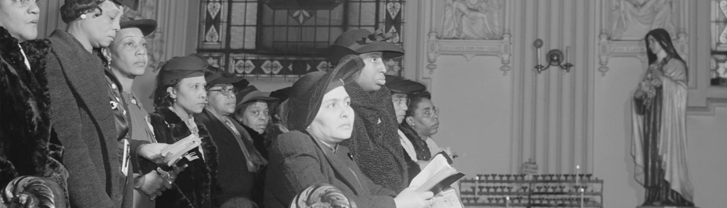 Researching Catholic Ancestors Delano, Jack, photographer. Sunday Mass at Saint Elizabeth's Catholic church. All the pastors here are white with the exception of Father Smith. The congregation is entirely colored. Chicago, Illinois. United States Cook County Illinois Chicago, 1942.