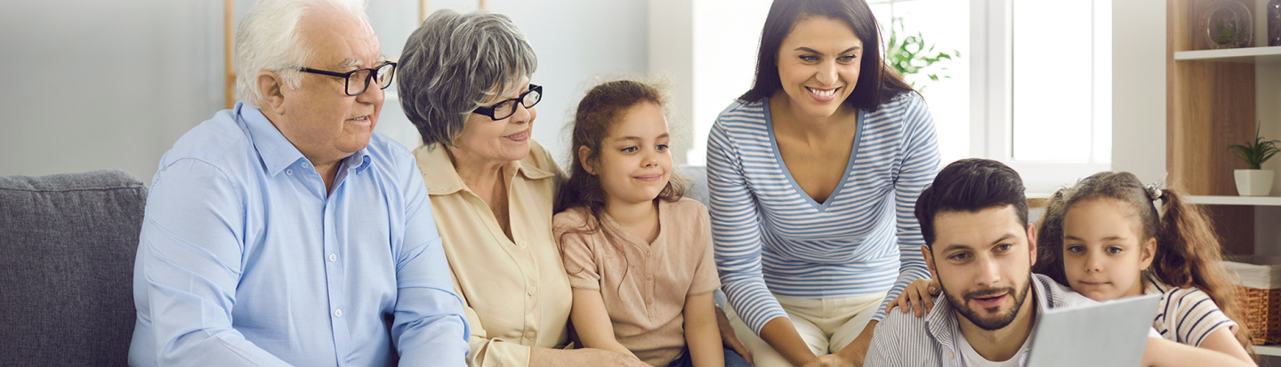 family looking at a computer