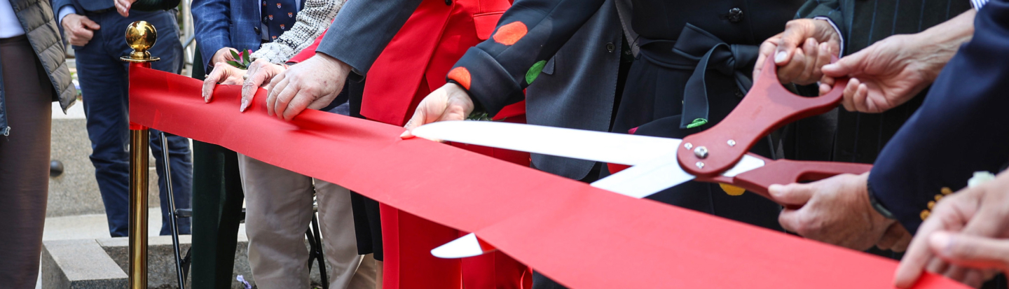 Cutting Ribbon at FHE Opening Event