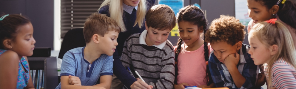 Children learning about family history in a classroom setting