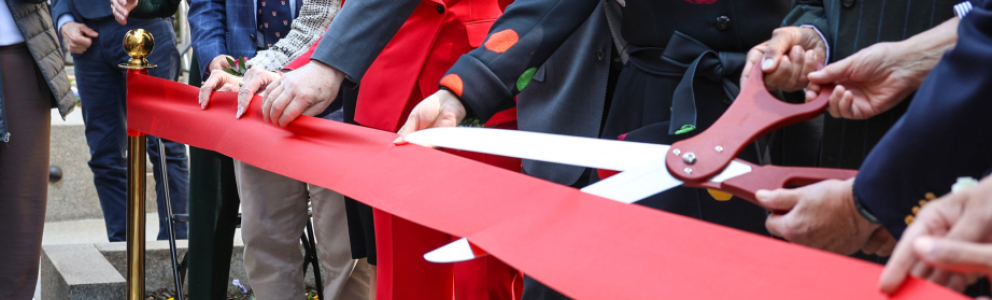 Cutting Ribbon at FHE Opening Event