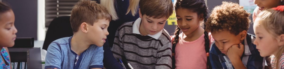 Children learning about family history in a classroom setting