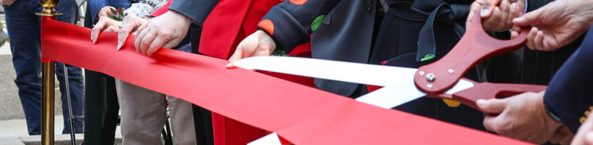 Cutting Ribbon at FHE Opening Event