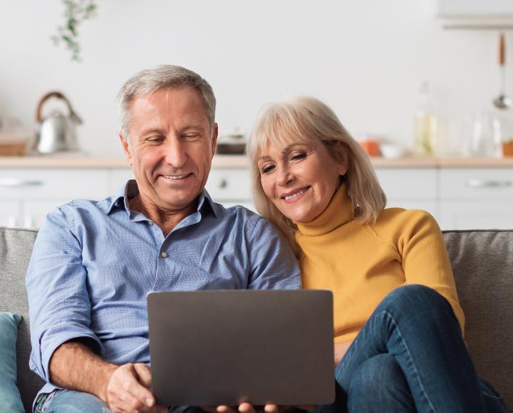 man and woman on computer
