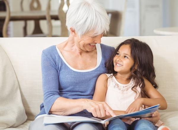 Grandmother and grandchild smiling