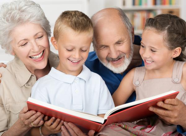 Family looking at album