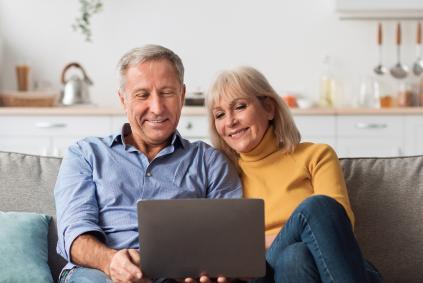 man and woman on computer