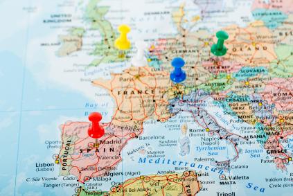 Planning a Trip to Your Ancestral Homeland map of Europe with pins in it