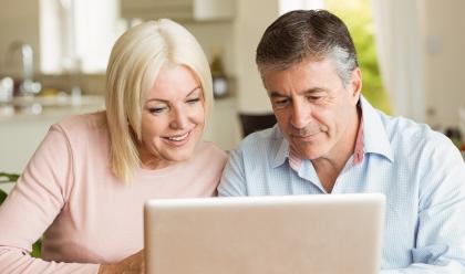 two people on laptop