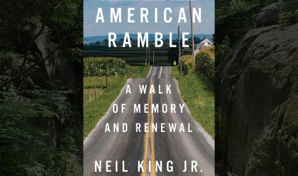 Neil King with American Ramble book cover with background of a road