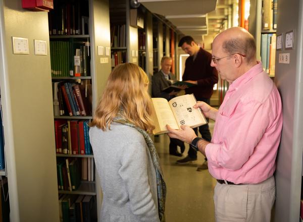 Group in the library stacks